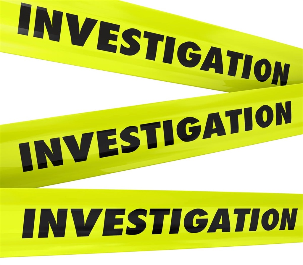 file image of crime scene tape saying investigation