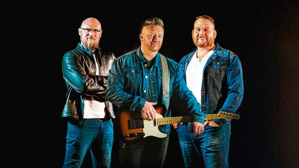 Foto van WEST, country-trio