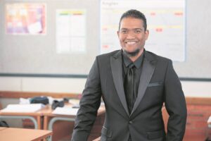 Apex High teacher Dillon Seals wins provincial excellence award in mathematics