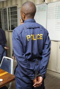 Police officer arrested on a charge of murder