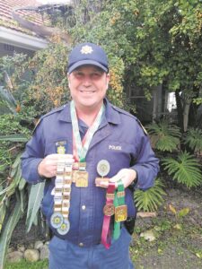 Police officer shoots for gold