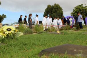 Pathologists perform exhumation of body
