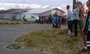Residents crawl to escape crossfire