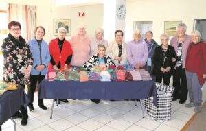 Andante-aftreeoord se breiers skenk winter-warmte vir Hanna Charity