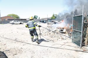 Angry residents set scrapyard ablaze