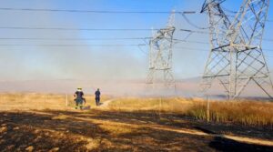 Firefighters keep watch after Table View blaze