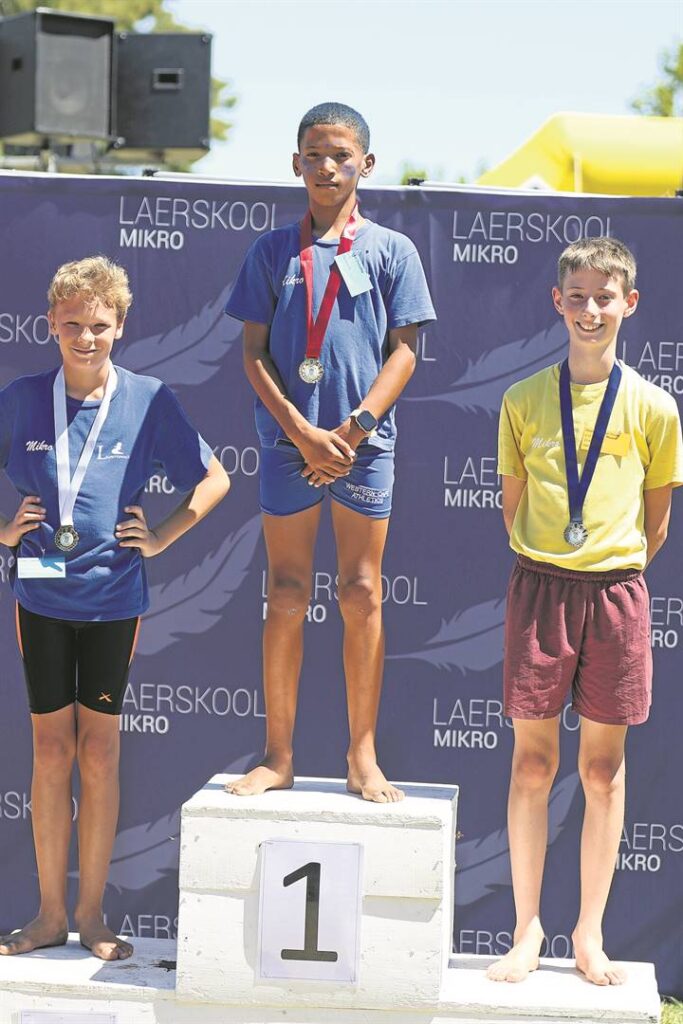 Corbin Christoffels (blou) het die 1200 m-rekord vir seuns o.12 verbeter. Ziaan Coetzee was tweede en Nicolas van der Merwe (geel) derde.