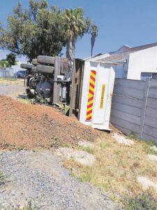 Tipper truck tips over in Plattekloof Glen