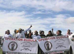 Protesters aiming to force migrant workers out