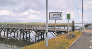 Sign at Woodbridge Island restored after pollution defacement