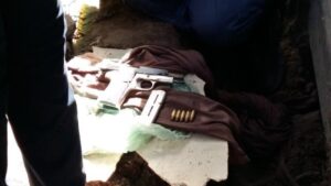 Police arrest gangster after guns, ammo dug up