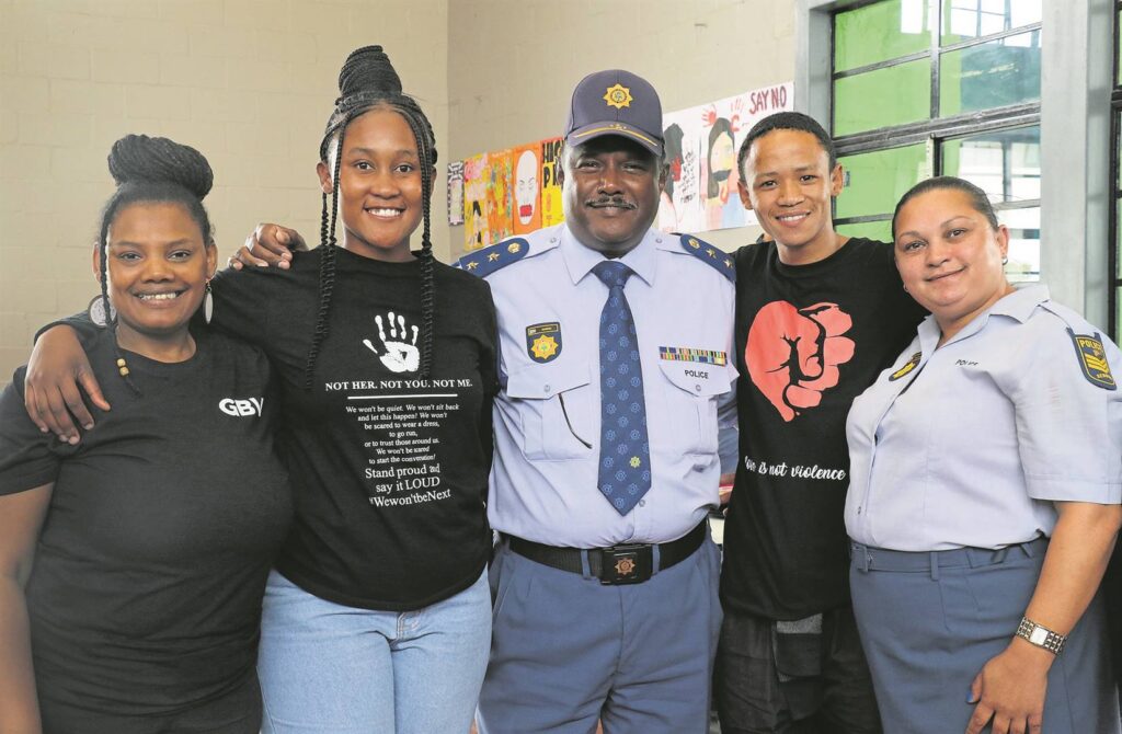 Kuils River Youth Desk members (from left), Marlene van Eyck, Alwaba Macawula, and Gershwin Duickers, who did a dramatisation of a poem about domestic violence, with Col Jayce Naidoo (station commander) and Sgt Nicky Willemse (domestic violence coordinator) of Kuils River police.PHOTO: Carina Roux