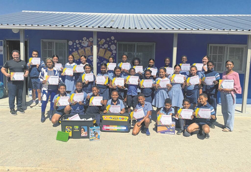 Rouxville Primary’s STEM club with teachers (from left) Keenan Daniels, Evelyn Moodley and Liezle Jansen.