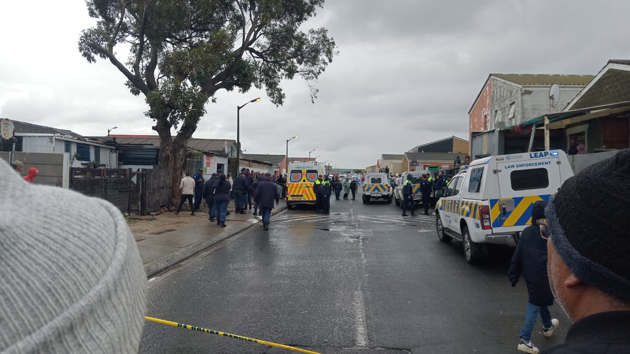 An image circulated on neighbourhood watch WhatsApp groups of police investigating one of several shootings in Mitchell’s Plain over the last few days.