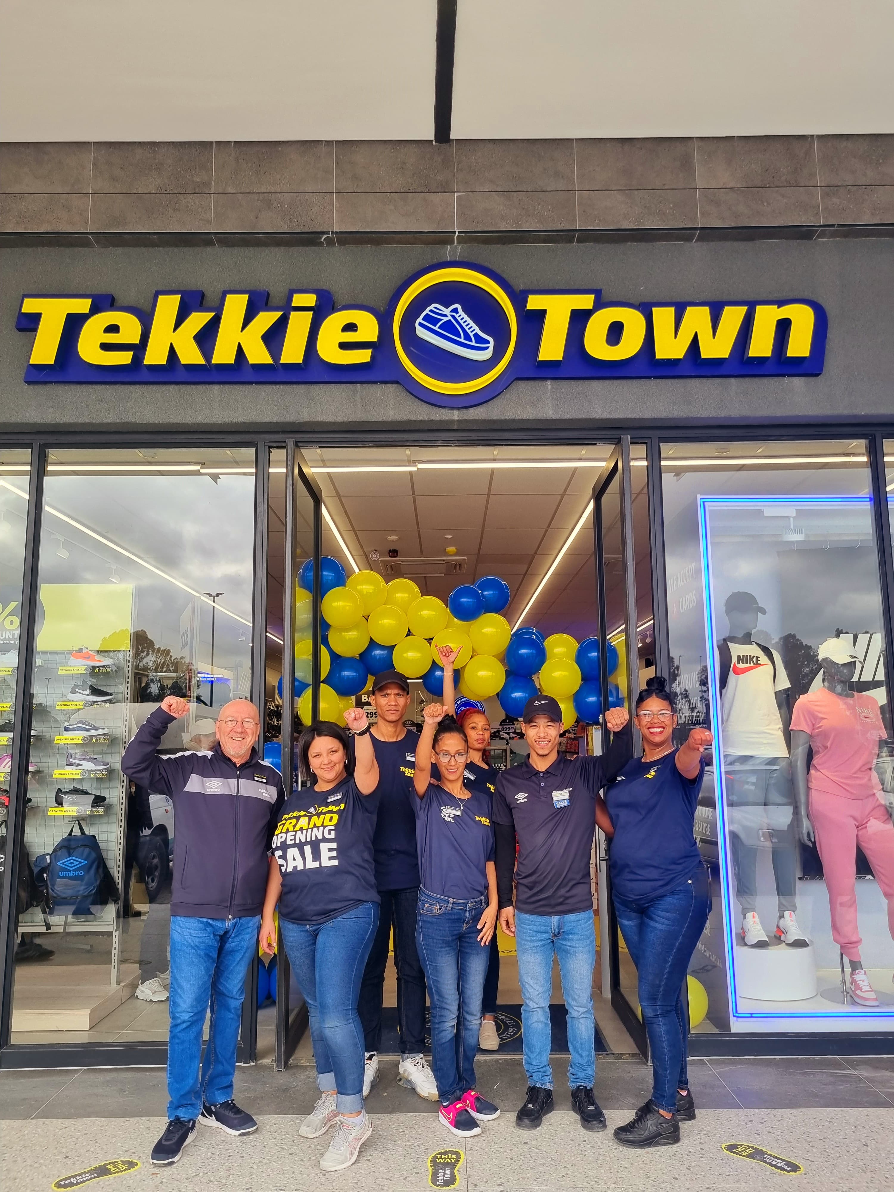 Here with the rest of the staff of Tekkie Town are (front from left) Vito Rallo (human relations manager) and Elzaan Julies (store manager).