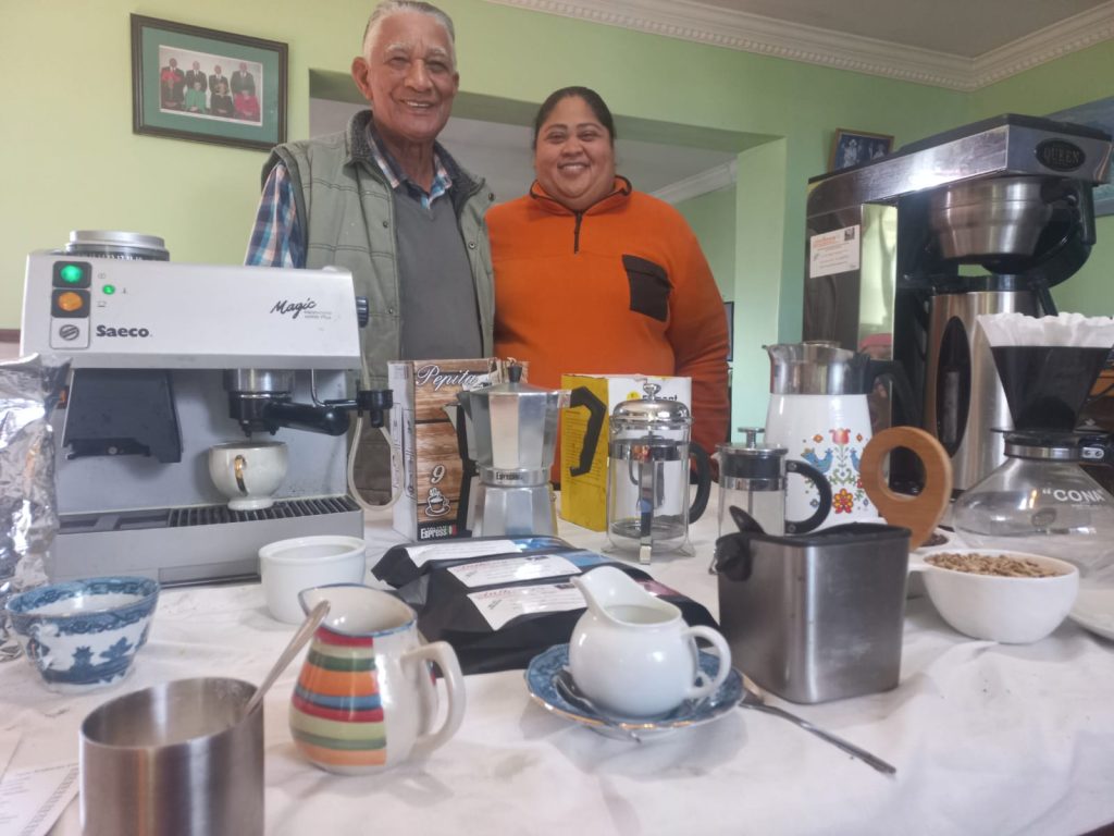 Anthony Swartz, 85 with his youngest daughter Ruth, 47, who he is training to take over from him in the coffee business.