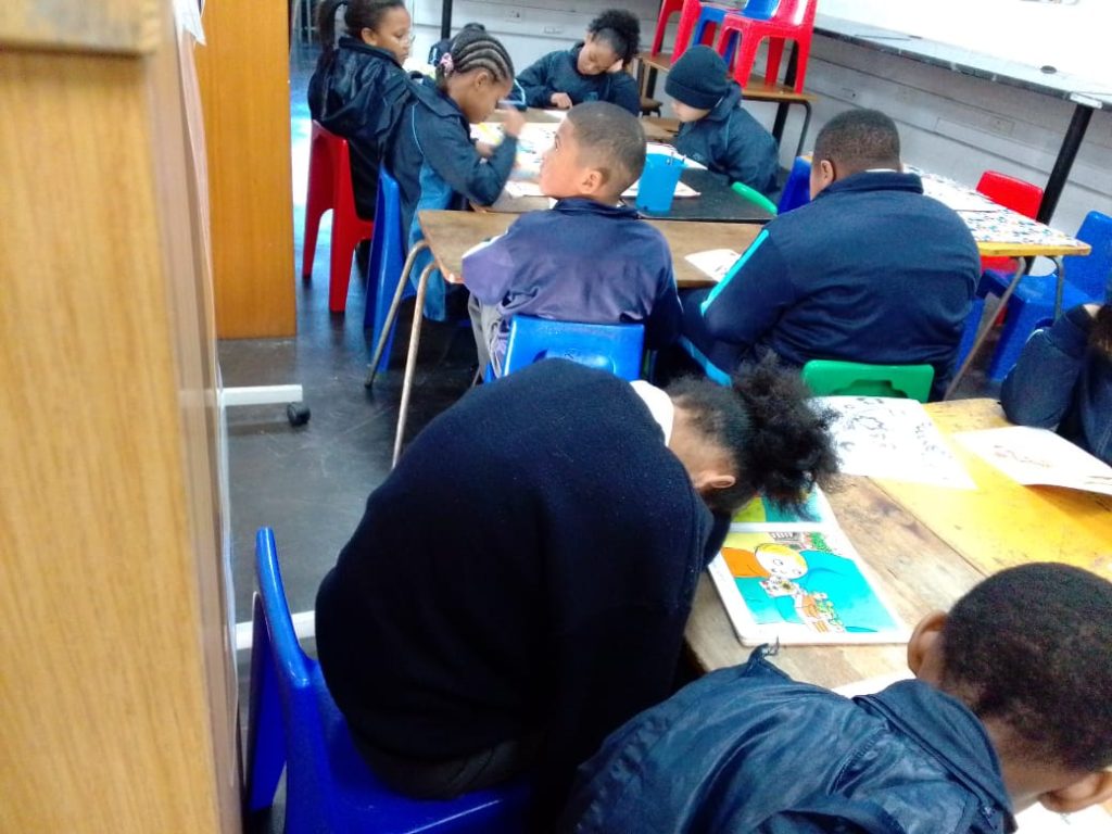 Children create some of their own Mandela Day art