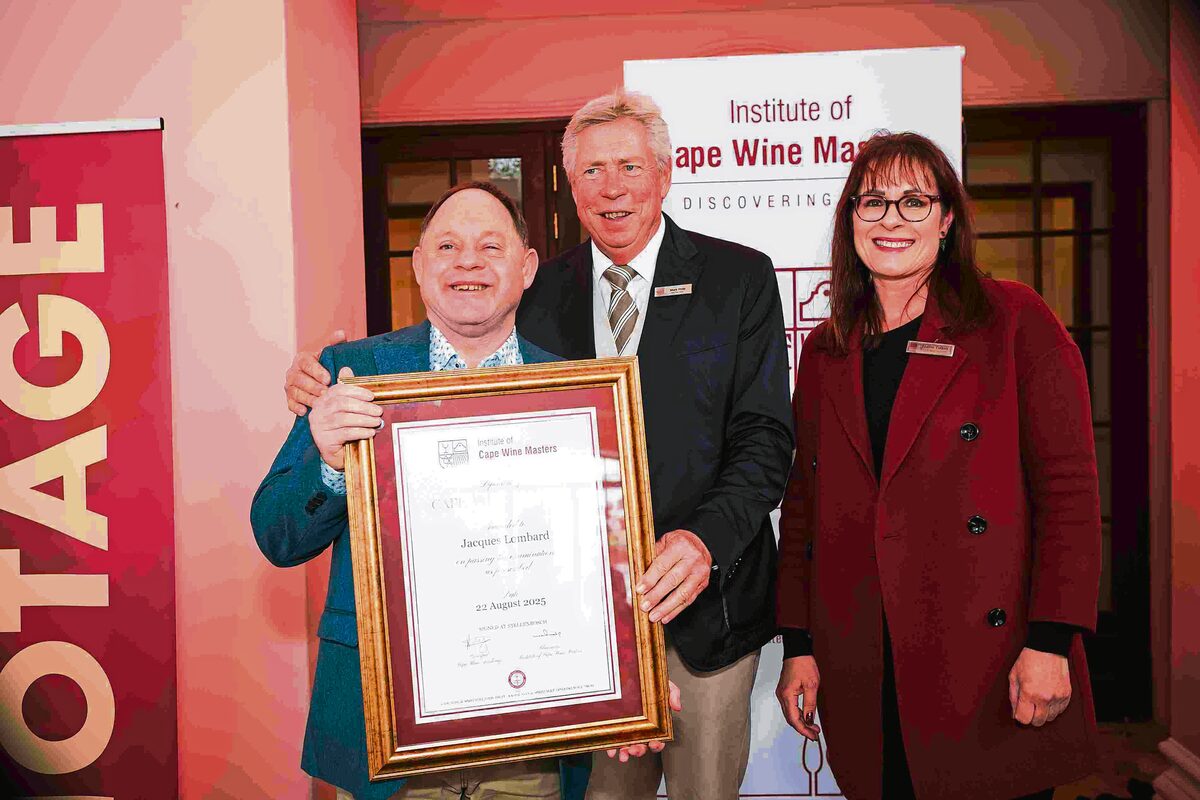 Jacques Lombard (left) receives his Cape Wine Masters certificate from Cape Wine Masters Mark Philp (chair of the Institute of Cape Wine Masters), and Lizette Tolken (chair of the education committee of the Institute of Cape Wine Masters). Photo: Matt Stow