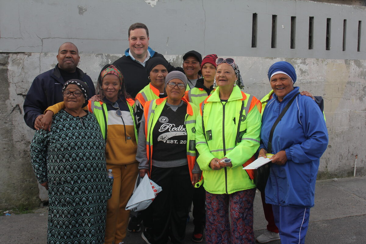 Mayor Geordin Hill-Lewis poses with the Beacon Valley Neighbourhood Watch.