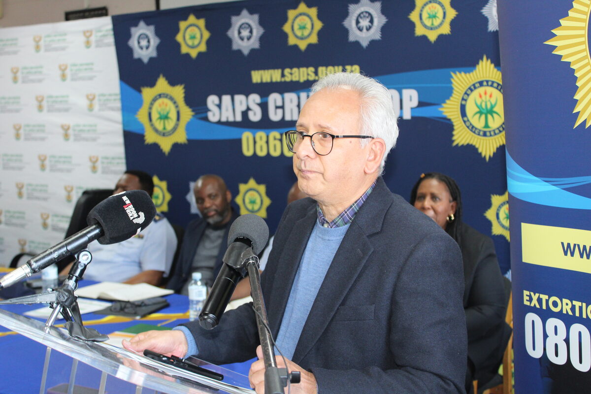 Minister of Police, Prof Firoz Cachalia addresses a public engagement at Mitchell's Plain police station.