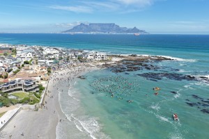 Hundreds paddle out to honour kite surfer at Bloubergstrand