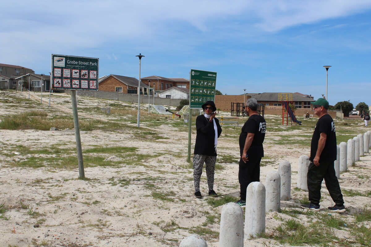Yoga Govender, Ismail Janodien and Brad Arendse stand among the molehills in front of Grebe Park which has had minimal upgrades in the last 30 years.