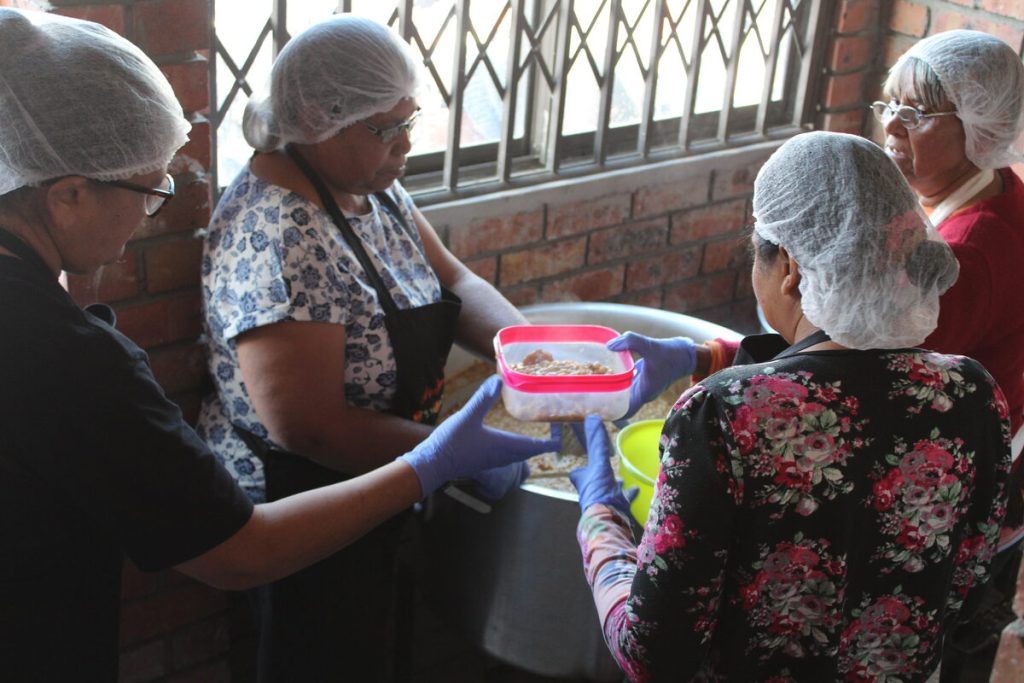 Arise Shine Africa feeds residents from its soup kitchen in Morgen's Village.