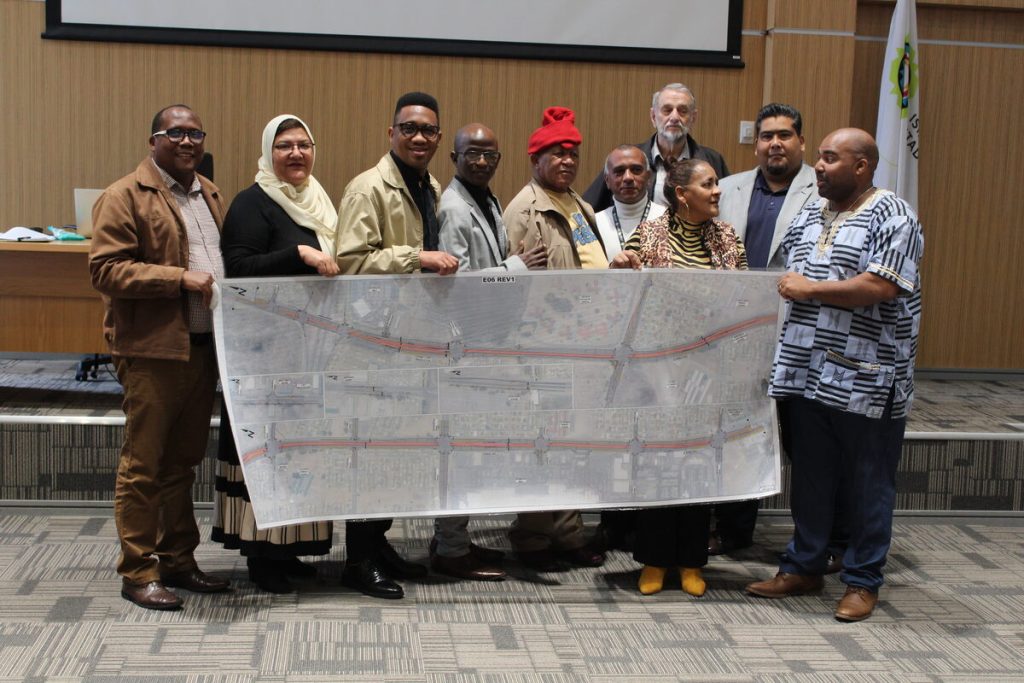 Sub-council 12 pose with the MyCiti project manager for Mitchell’s Plain and the bus route map.