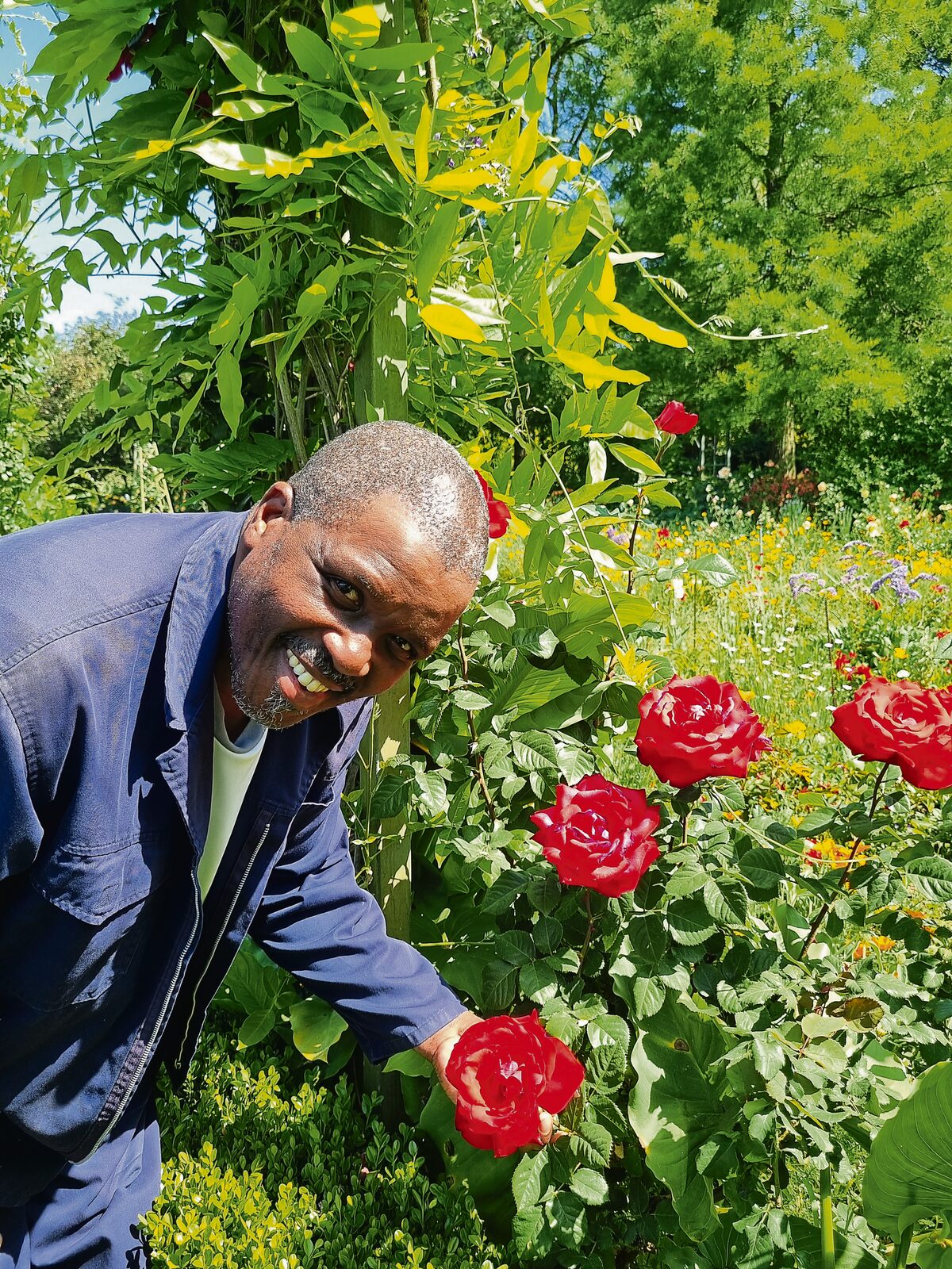 Sammy Dakuse is the rose whisperer of the garden. He has been working in the garden for the past 23 years.