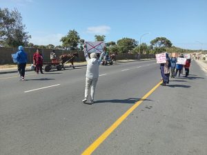 The bus stops here, residents protest
