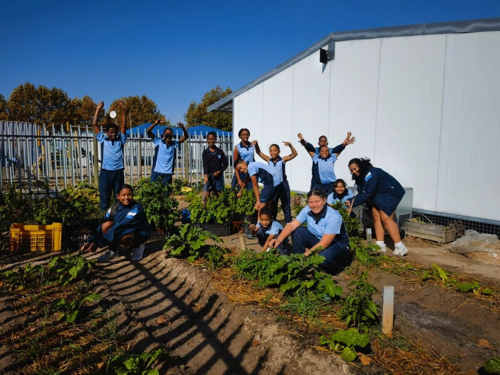 Learners of Rouxville Primary's environmental club in the school's garden.