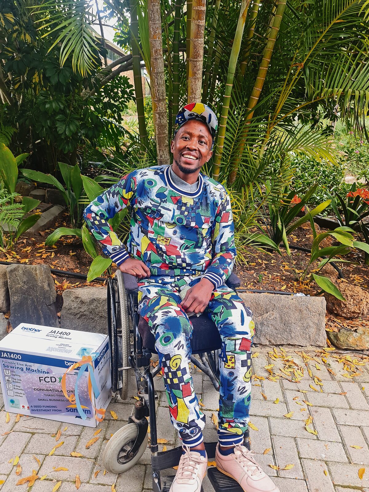 Thabu Tyhulu travelled for nine weeks in his wheelchair from Mfuleni to Durbanville by taxi to attend the sewing course.