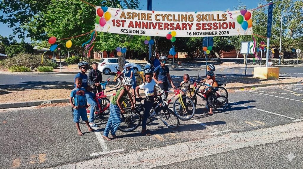Photo of youngsters on bicycles.
