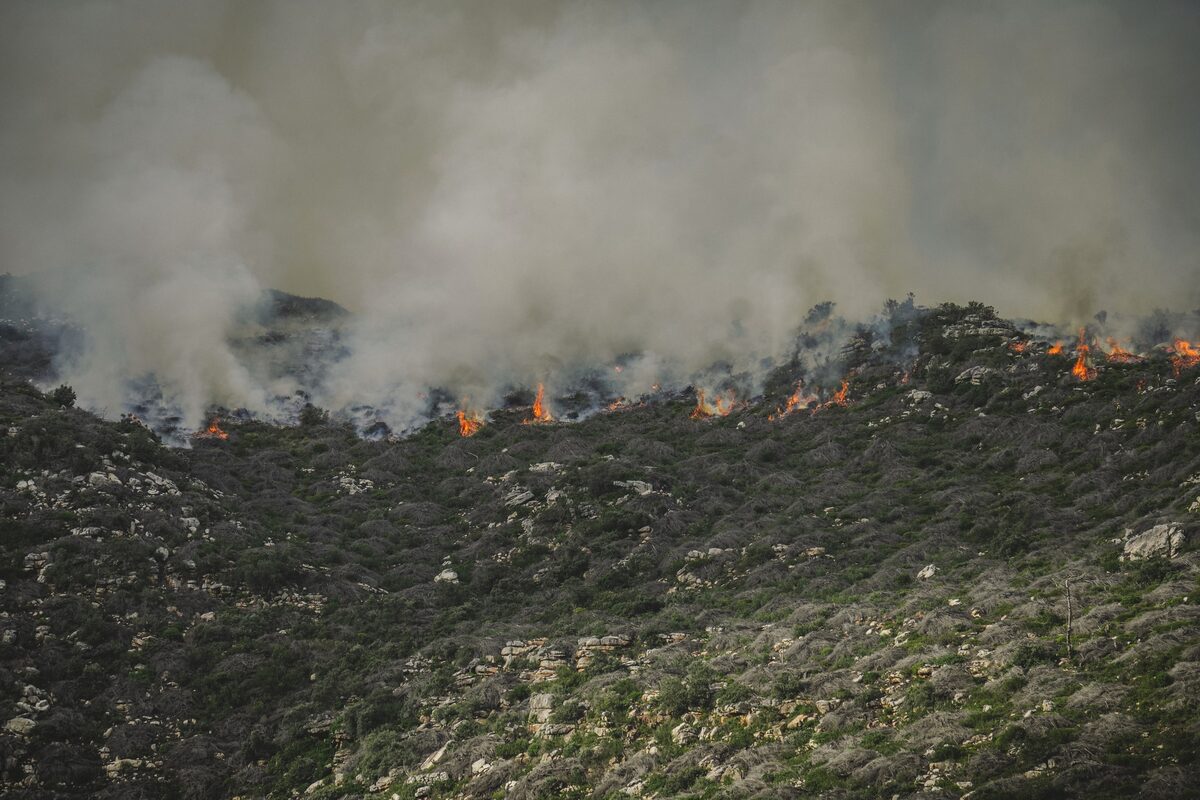 Hotspots continue to challenge teams in tough mountain areas. Photo: NCC Environmental Services