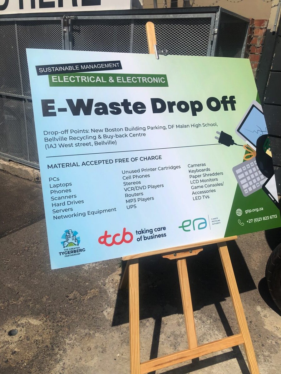 Warren Hewitt from the Greater Tygerberg Partnership showcases the new e-waste drop-off signage promoting responsible electronic recycling in Bellville.