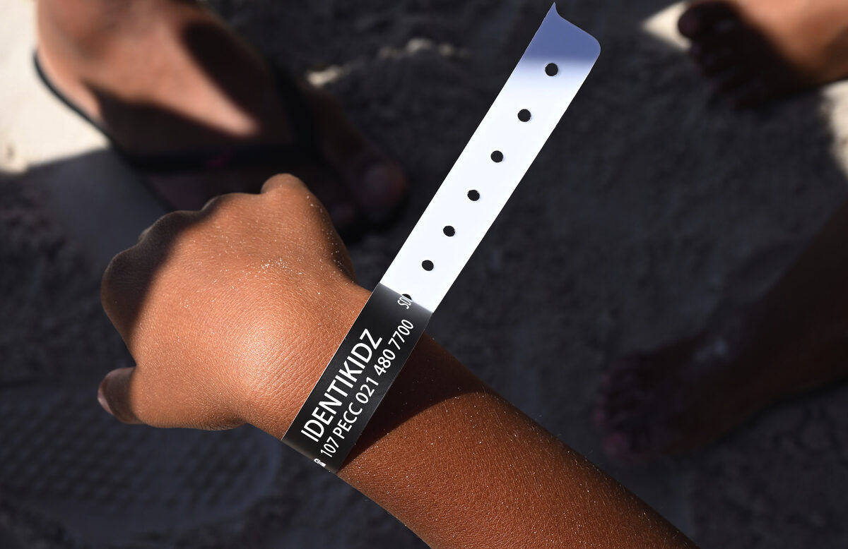 Children were tagged with armbands linked to their parents details.