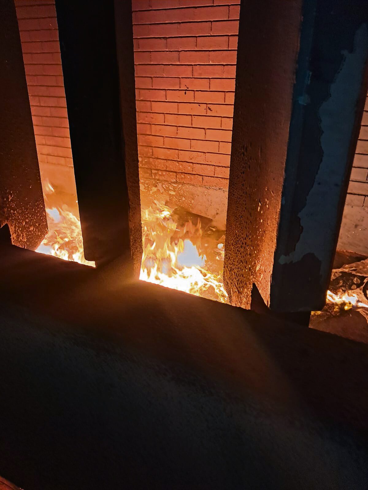 Fire services extinguish a refuse fire next to Milnerton Library on 16 January, preventing damage to the municipal building.