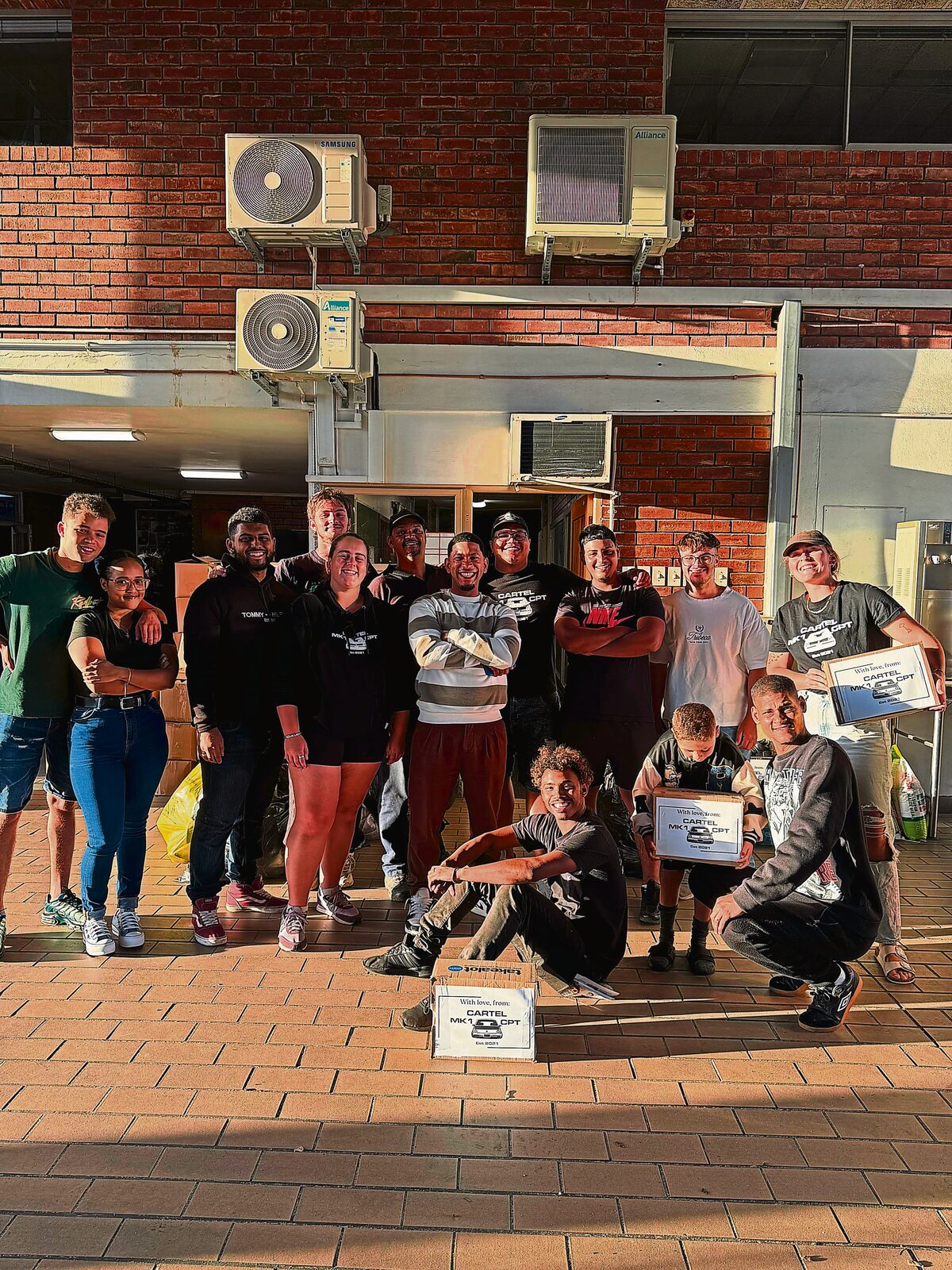 MK1 Cartel car crew delivers essential donations to Dunoon fire victims at Goodwood Fire Station.