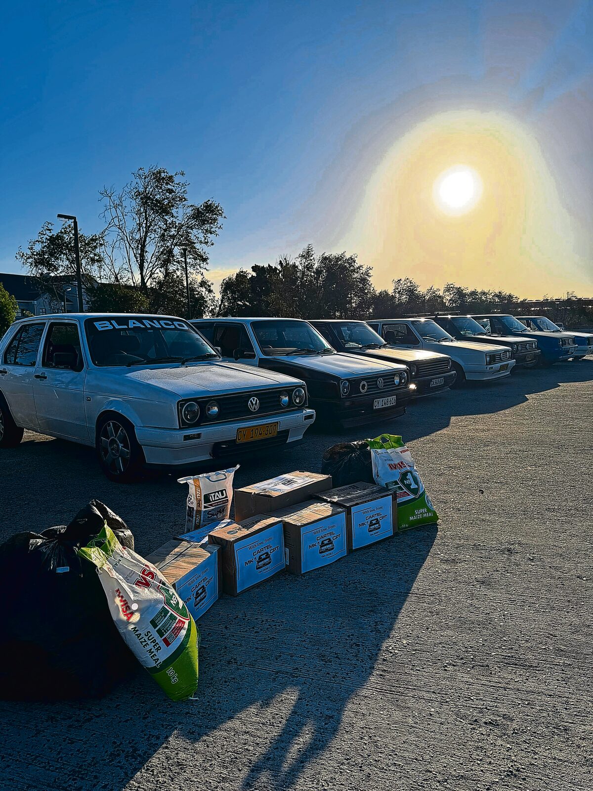 MK1 Cartel's monthly charity drive delivers essential goods like food, toiletries, and clothing to those in need.