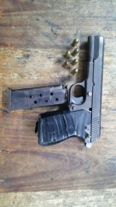 Police confiscate gun, suspect in court