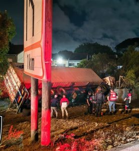 Truck driver hospitalised after container truck overturns on the N1