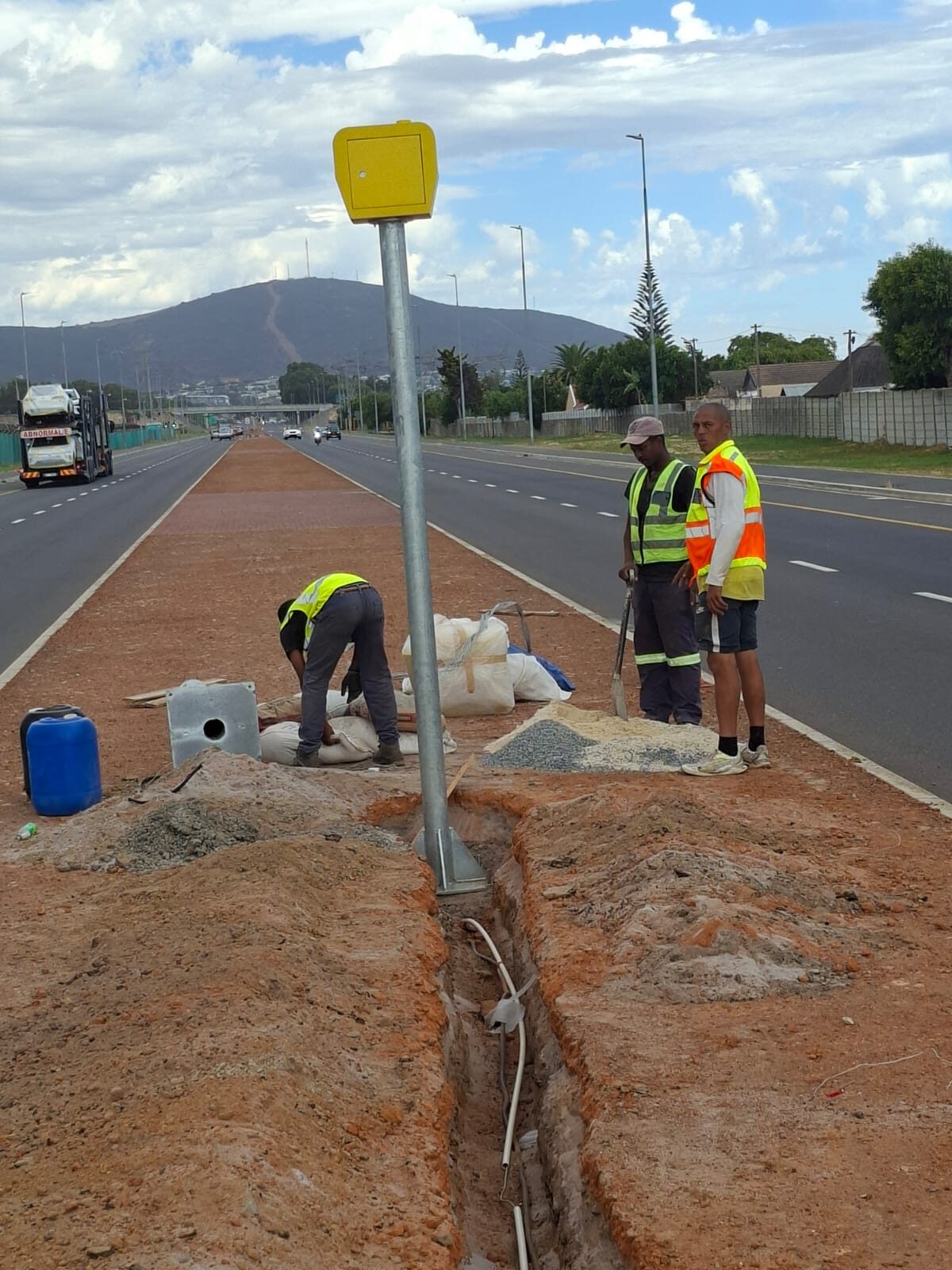 Workers busy installing the new speed camera on Plattekloof Road recently.