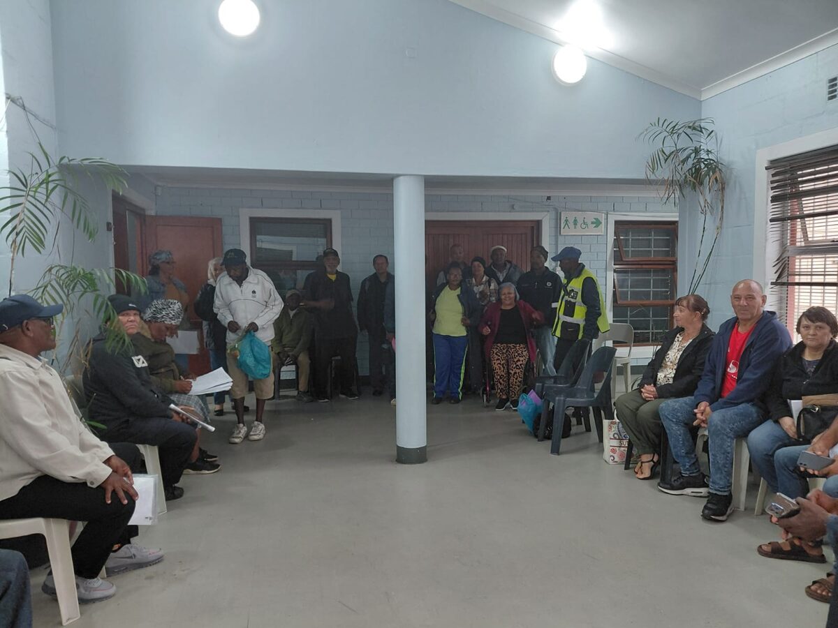 he group of elderly was eventually called out from the rain to sit inside the foyer.