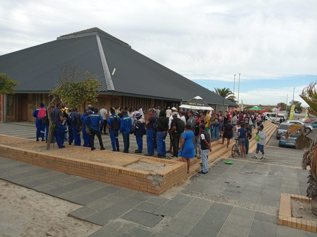 A queue of hundreds of unemployed people snaked from inside the Rocklands Civic Centre right around the building,.