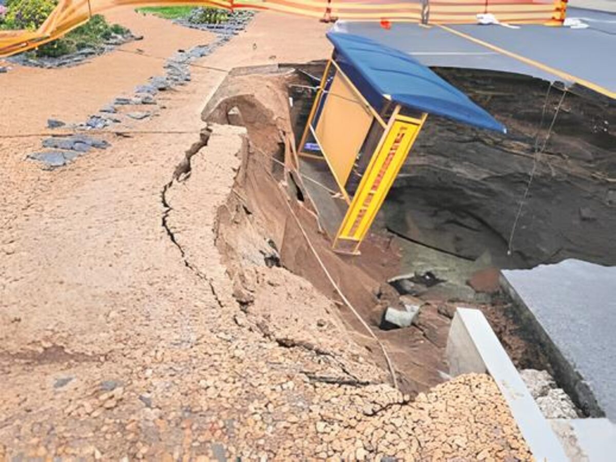 One of the first sewer collapses along Montague Drive.