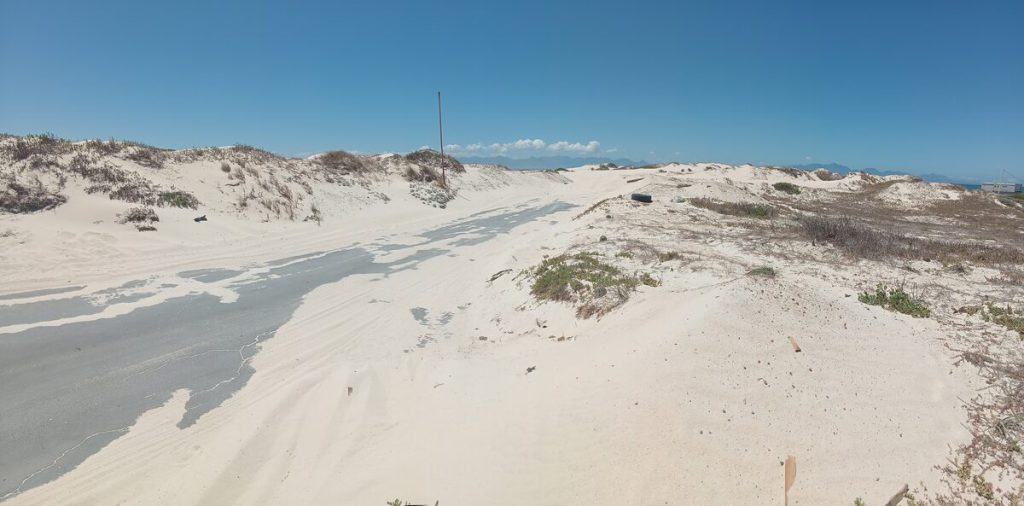 Lukannon Drive is completely closed off in places due to sand.