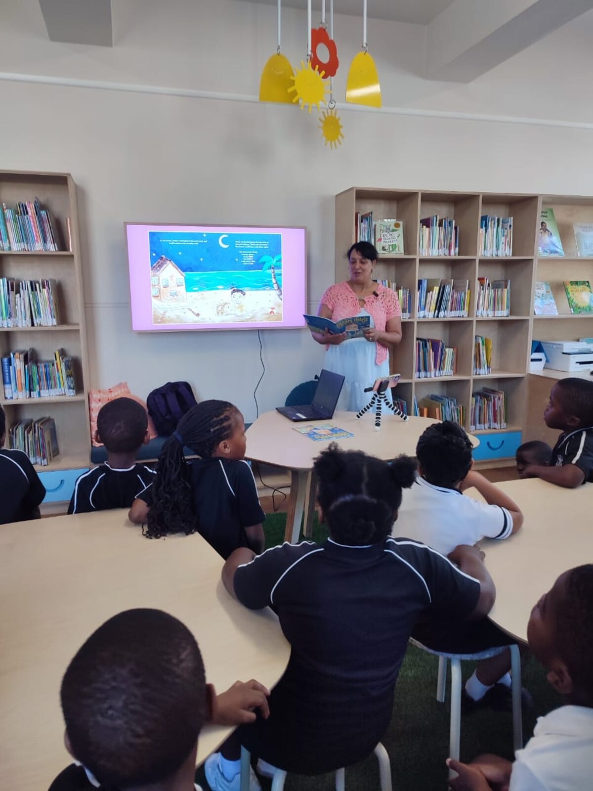 Author Lauren O'Connor-May reads to grade 1s at St Mary's Primary School.