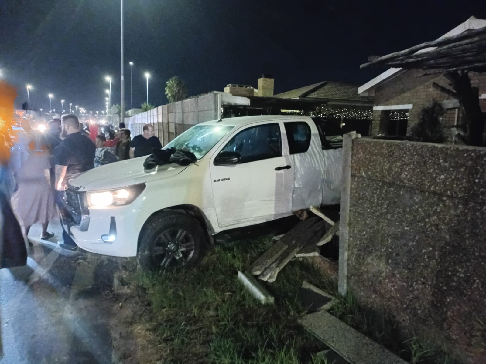 Both vehicles crashed through residential boundary walls following the high-speed collision in Darwin Street.