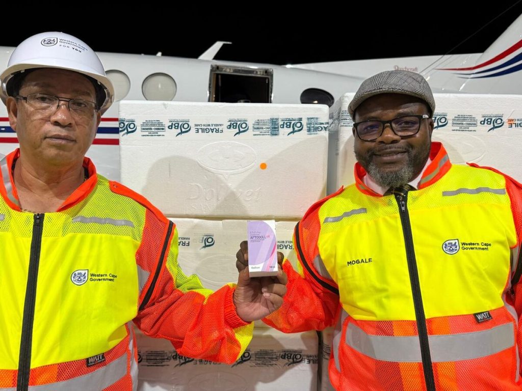 Provincial agriculture minister Dr Ivan Meyer and head of the department of agriculture in the Western Cape Dr Mogale Sebopetsa at the airport on Tuesday evening when the vaccines arrived.