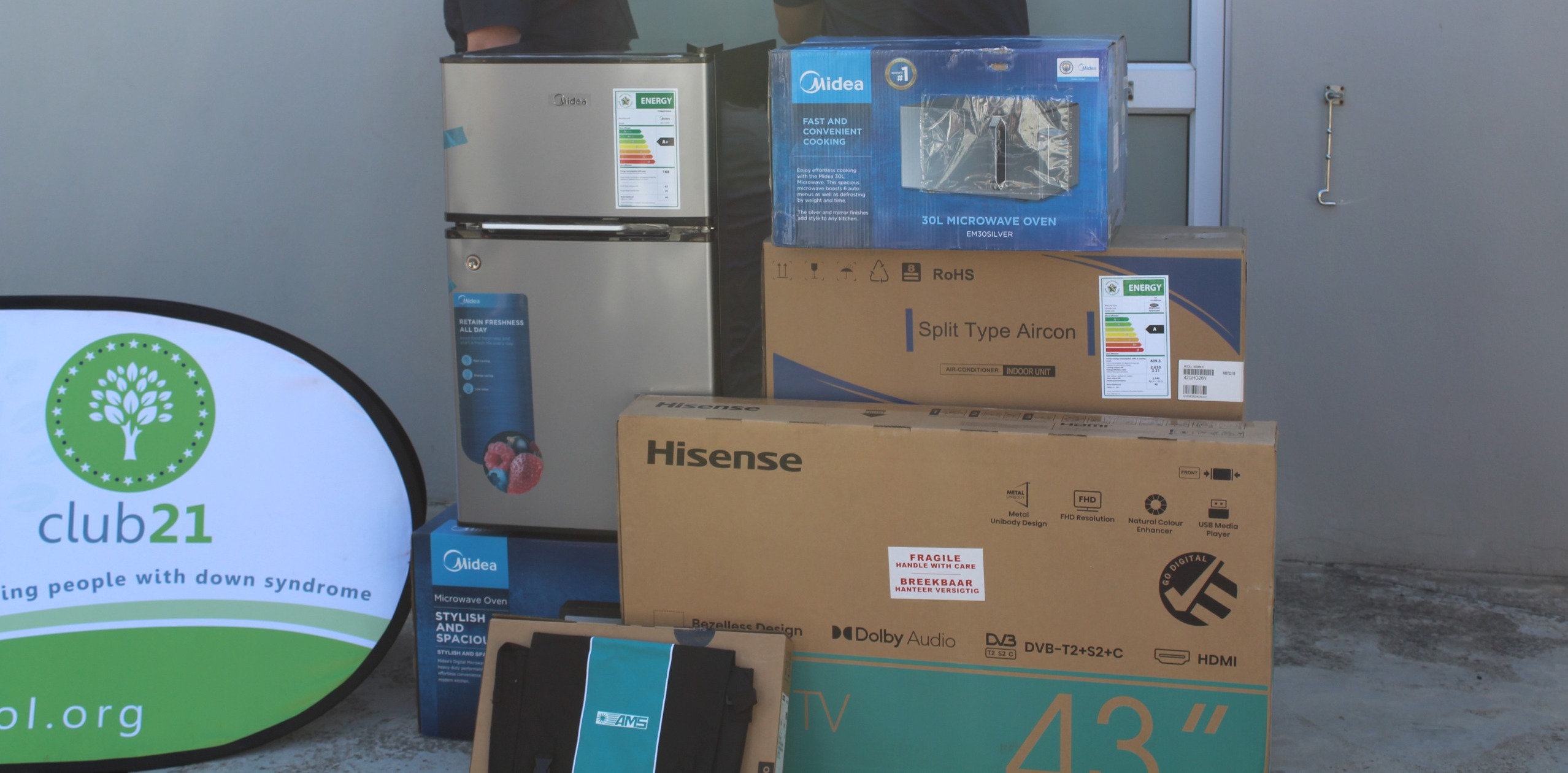 The donation included vital classroom technology carefully selected from Club21 Bellville's wish list - a laptop for educational programs, a television for interactive learning, and various classroom supplies.
